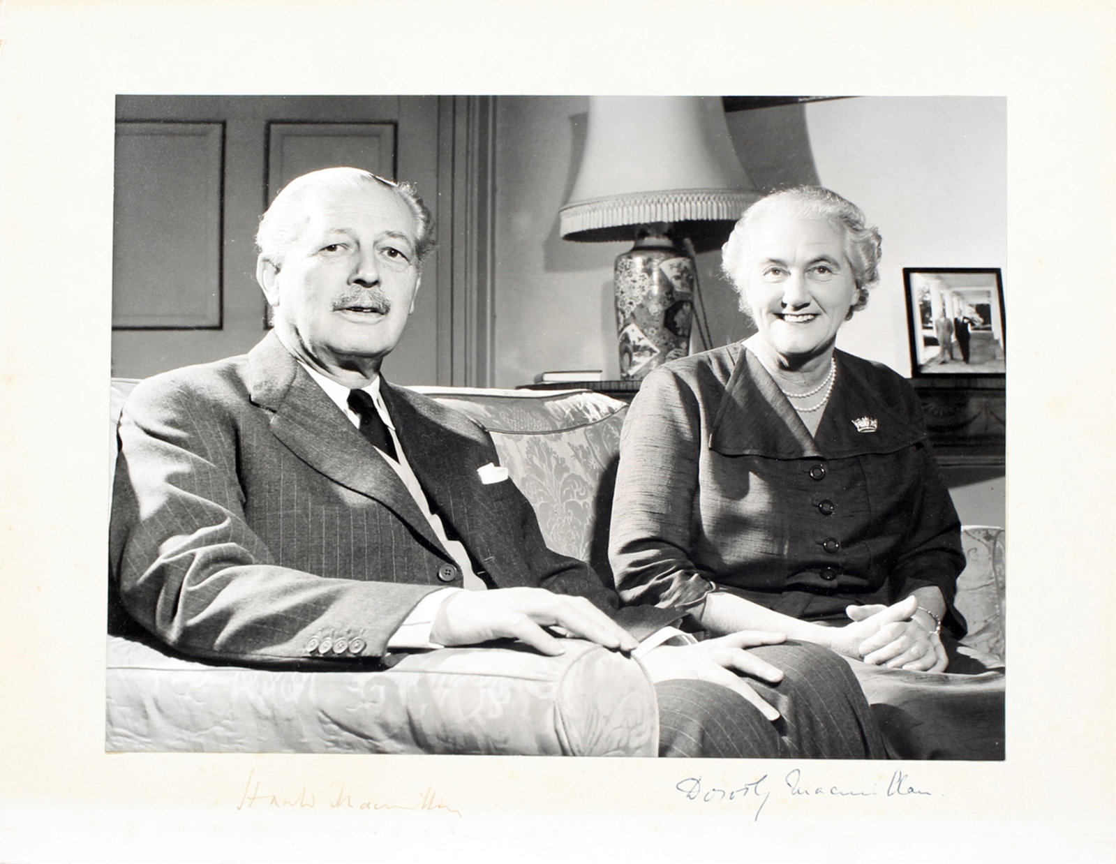 HAROLD & DOROTHY MACMILLIAN SIGNED PHOTOGRAPH: HAROLD & DOROTHY MACMILLIAN SIGNED PHOTOGRAPH Signed Photo – Sir Harold MacMillan, Earl of Stockton and Prime Minister of the United Kingdom, together with his wife Dorothy, unusually signed by both