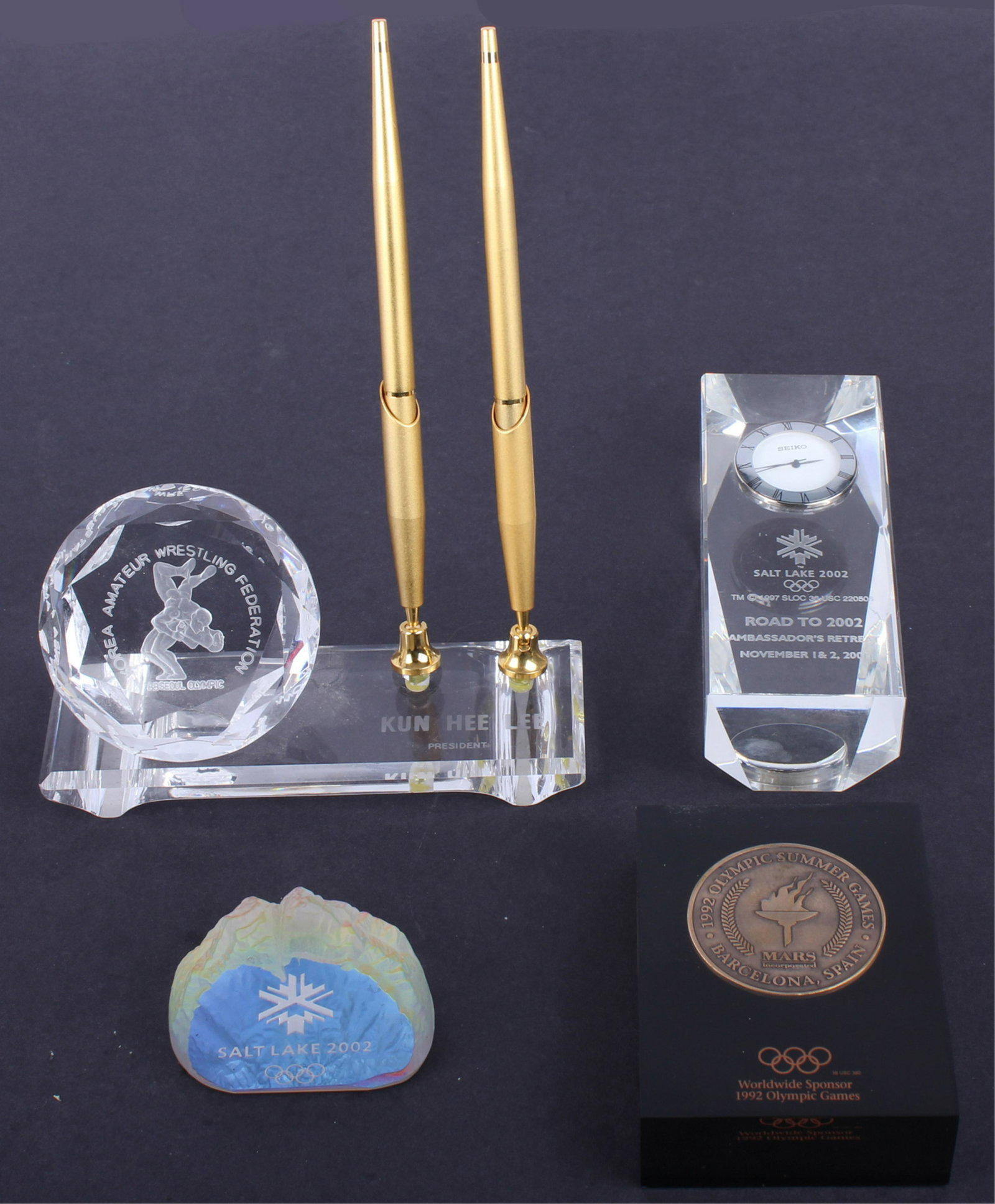 OLYMPIC CRYSTAL DESK ITEMS - LOT OF 4: OLYMPIC CRYSTAL DESK ITEMS - LOT OF 4 Olympic crystal desk items including one Salt Lake 2002 ambassador's retreat gift desk clock, President Kun Hee Lee Korean amateur wrestling federation desk pen s