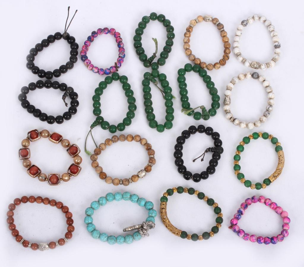 ASSORTED ASIAN BEADED BRACELETS - LOT OF 18: ASSORTED ASIAN BEADED BRACELETS - LOT OF 18 Assorted Asian beaded bracelets - lot of 18. Size: 3" Largest