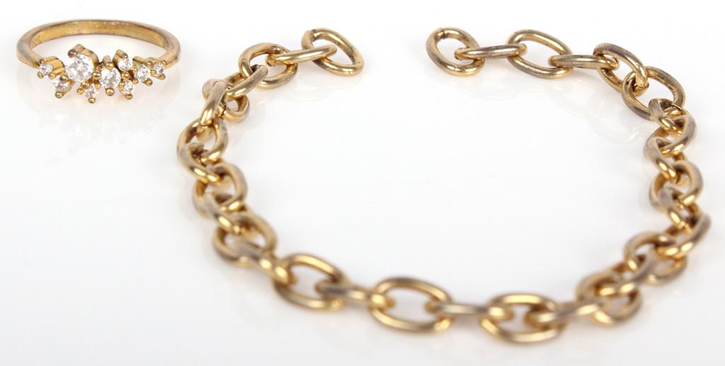10K YELLOW GOLD RING AND CHAIN: 10K YELLOW GOLD RING AND CHAIN 10K yellow gold ring (Size 5.75) and chain (8" Length). Weight: 9.81 Grams Size: 5.75 Ring, 8" Chain