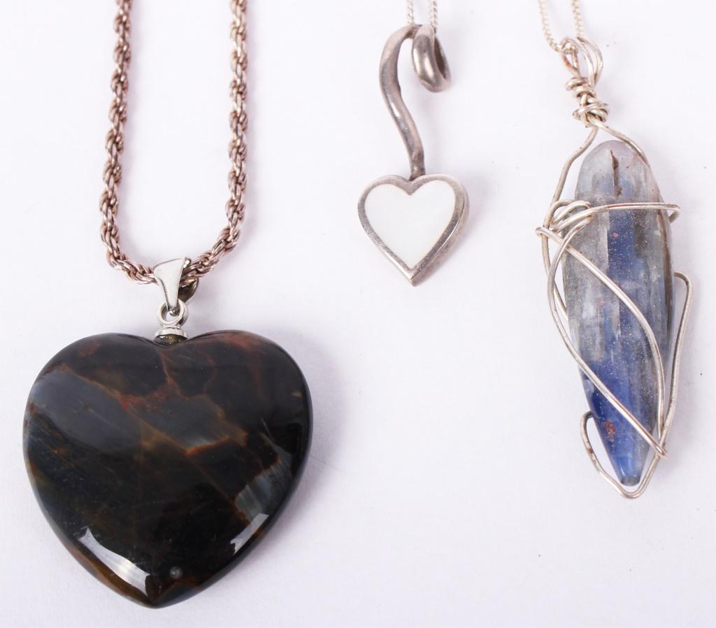 STERLING SILVER NECKLACES W/ PENDANTS - LOT OF 3: STERLING SILVER NECKLACES W/ PENDANTS - LOT OF 3 Sterling silver necklaces with stone pendants - lot of 3 to include one Mother of Pearl pendant, one Labradorite pendant, and one Cyanite pendant.Weigh