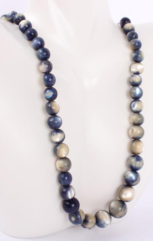 BLUE AND WHITE ABALONE BEADED NECKLACE: BLUE AND WHITE ABALONE BEADED NECKLACE Blue and white iridescent Abalone beaded necklace. Size: 29" Length