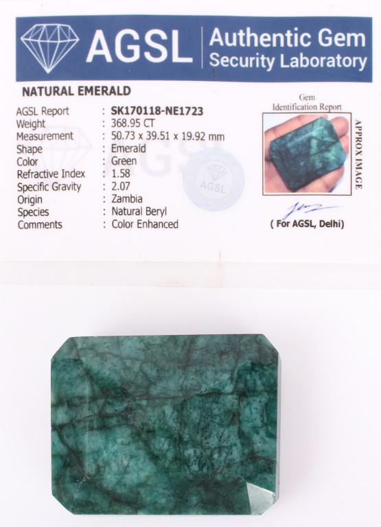 NATURAL ZAMBIAN 368.95CT EMERALD WITH AGSL CERT.: NATURAL ZAMBIAN 368.95CT EMERALD WITH AGSL CERT. Natural Zambian 368.95Ct. beryl emerald cabochon with square cushion shape and Authentic Gem Security Laboratory card. Weight: 73.4 GramsSize: 2 X 1.56