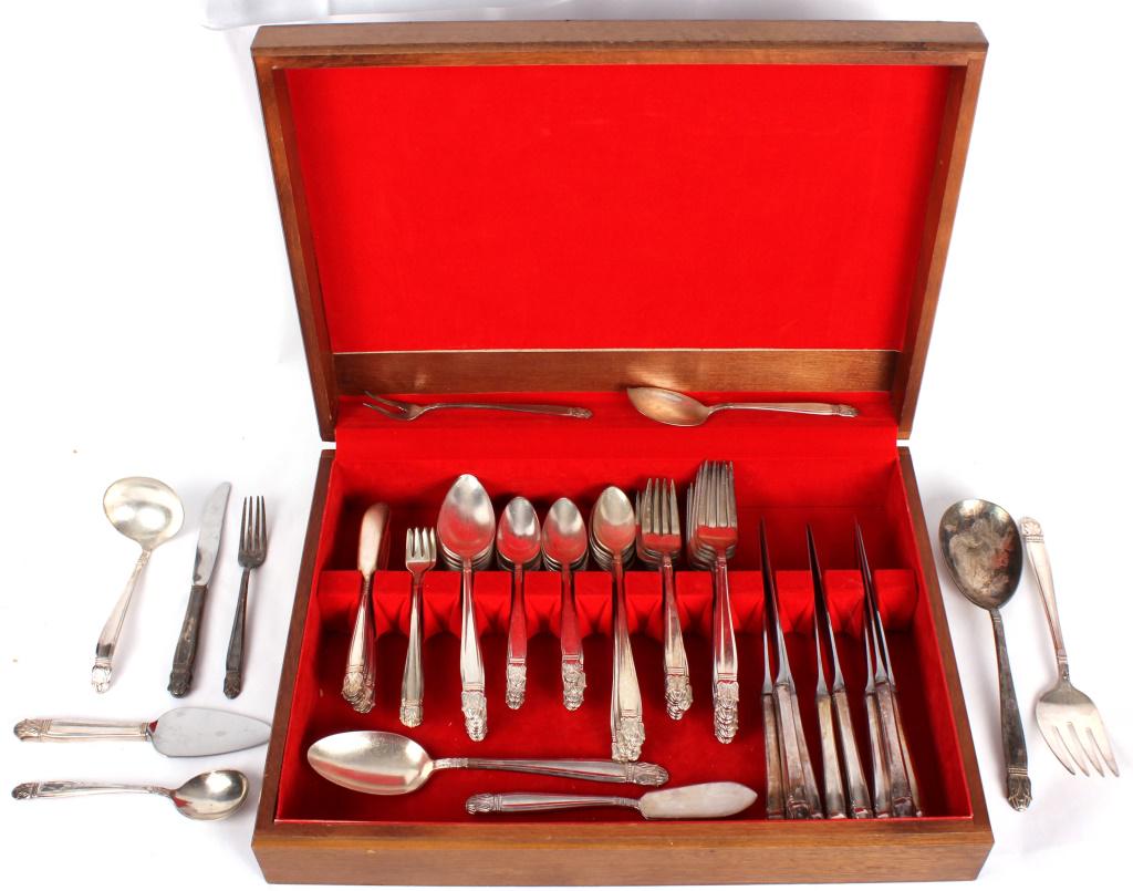 HOLMES & EDWARDS INLAID SILVER FLATWARE - 77: HOLMES & EDWARDS INLAID SILVER FLATWARE - 77 Holmes & Edwards inlaid silver plated and stainless steel flatware set. Lot of 77 to include 1 felt lined wood case, 9 butter knives, 8 table forks, 8 dess