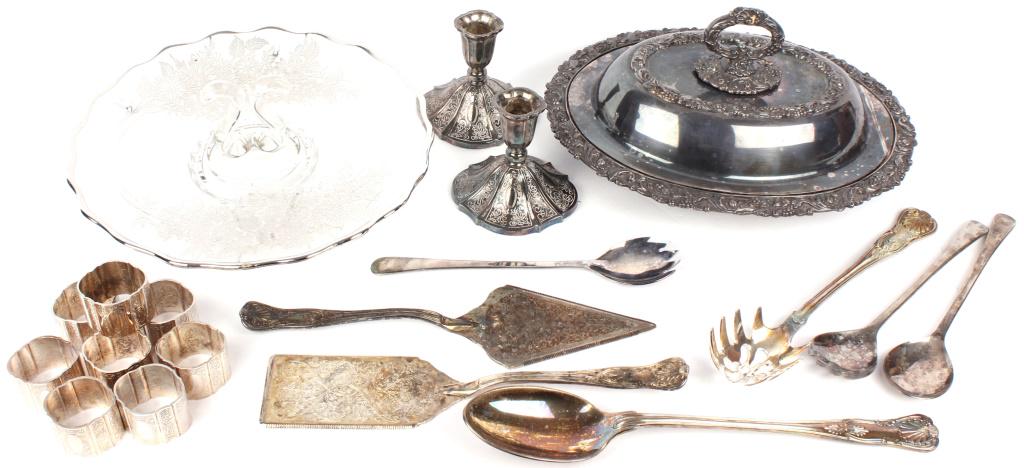 ASSORTED VINTAGE SILVER TABLEWARE- LOT OF 17: ASSORTED VINTAGE SILVER TABLEWARE- LOT OF 17 Assorted vintage silverplate tableware. Lot of 17 to include, two candlesticks, one covered serving platter, one floral monogrammed glass serving tray, fiv