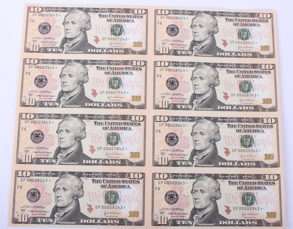 UNCUT SHEET OF 2004 10 DOLLAR BILLS: UNCUT SHEET OF 2004 10 DOLLAR BILLS Uncut sheet of 2004 10 dollar bills, 8 bills on sheet, had a 80 dollar face value.