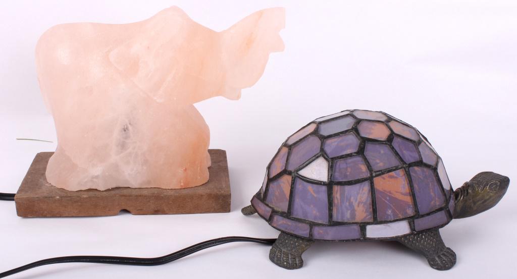 ELECTRIC LAMP SCULPTURES - LOT OF 2: ELECTRIC LAMP SCULPTURES - LOT OF 2 Electric lamps depicting animals. Lot of 2. To include one glass and metal lamp depicting a turtle and one sculptured soapstone lamp depicting an elephant.Size: 7 X