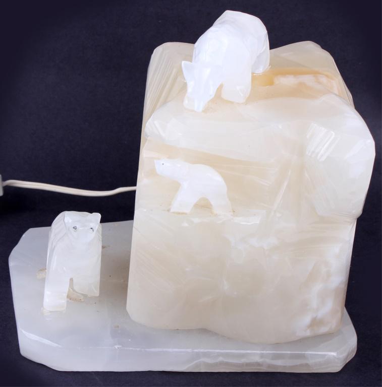HAND CARVED SOAPSTONE POLAR BEAR TABLE LAMP: HAND CARVED SOAPSTONE POLAR BEAR TABLE LAMP Soapstone polar bear hand carved table lamp Size: 9" Condition: Needs new bulb. Small bears on base need to be re-affixed.