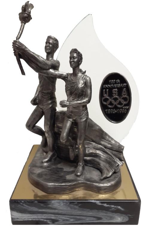 MICHAEL RIKER CENTENNIAL OLYMPICS PEWTER STATUE: MICHAEL RIKER CENTENNIAL OLYMPICS PEWTER STATUE Michael Riker (1940-2006, American) 1996 US Olympic Atlanta centennial statue with solid marble base and pewter figures depicting two athletes carrying
