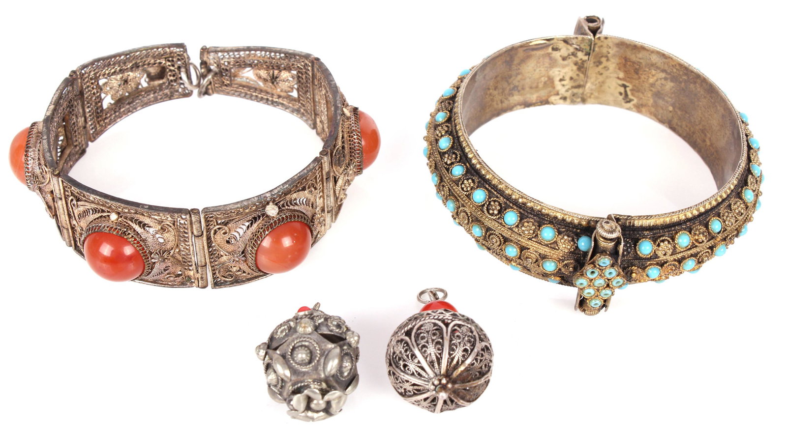 MIDDLE EASTERN STERLING FILIGREE JEWELRY (4): MIDDLE EASTERN STERLING FILIGREE JEWELRY (4) Middle Eastern sterling silver filigree jewelry to include one amber quartz bracelet, one turquoise cuff bracelet, and 2 sterling filigree pendants with re
