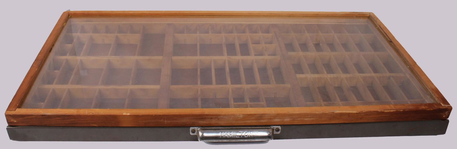 HAMILTON MFG.VINTAGE LETTERPRESS TYPESET DRAWER: HAMILTON MFG.VINTAGE LETTERPRESS TYPESET DRAWER Vintage letterpress typeset drawer with steel drawer pull by Hamilton Manufacturing Company. Size: 32 X 17"