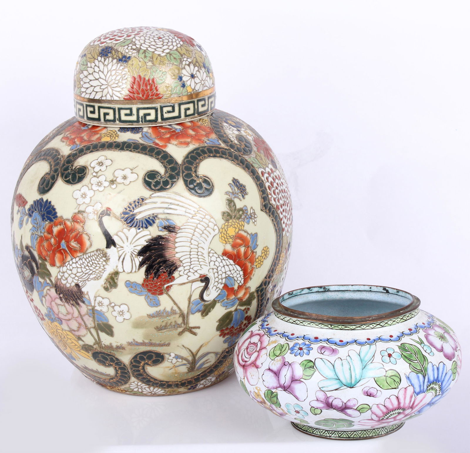 CHINESE GINGER JARS - LOT OF 2: CHINESE GINGER JARS - LOT OF 2 Chinese ginger jars to include one porcelain highly decorative covered ginger jar depicting cranes and one enamel over brass ginger jar without lid. Size: 11" Tallest