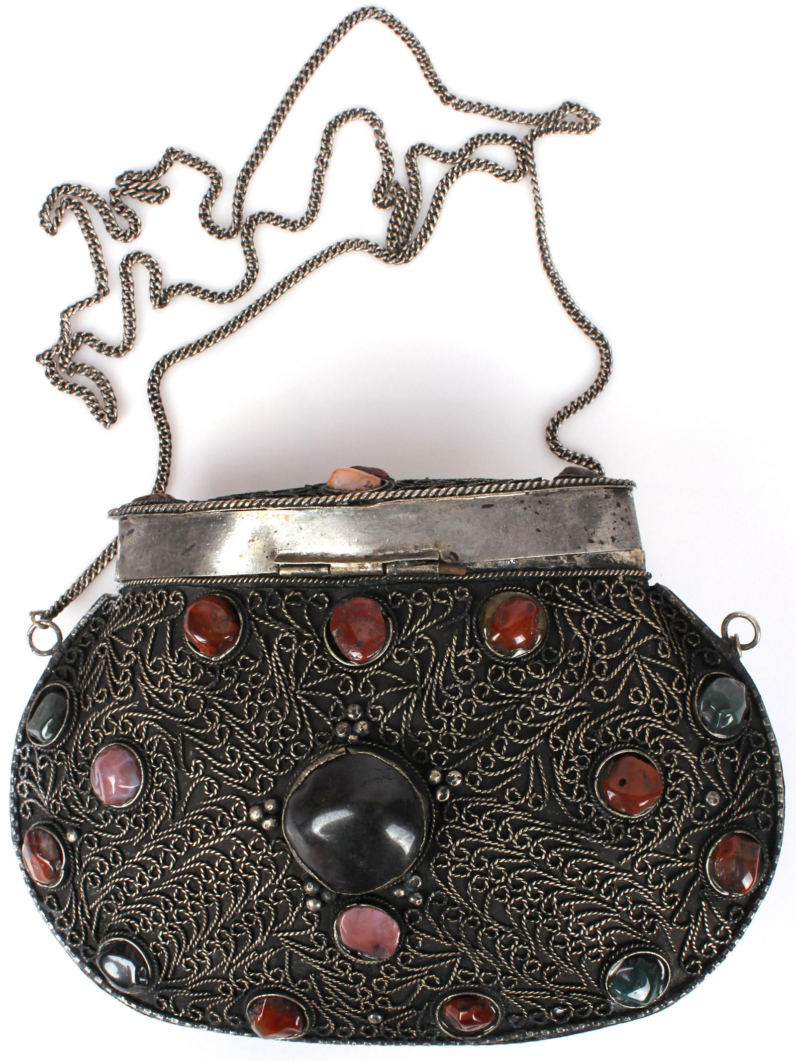 MIDDLE EASTERN GEMSTONE FILIGREE METAL PURSE: 97144MIDDLE EASTERN GEMSTONE FILIGREE METAL PURSE Middle Eastern antique gemstone filigree metal purse. Size: Purse 6.5" across, 23" w/ chain