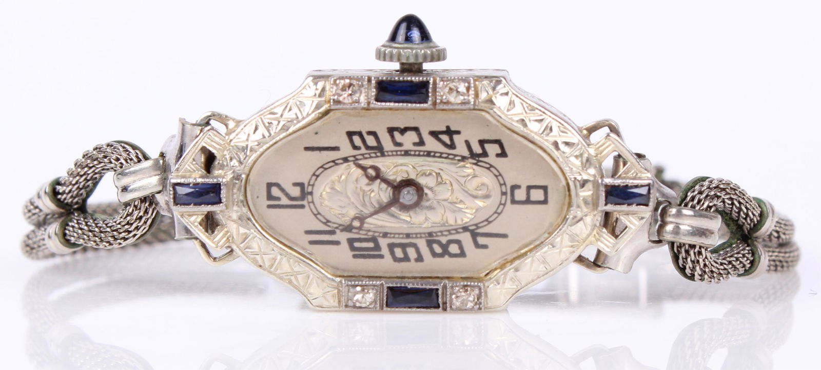 ANTIQUE LADIES 18K WHITE GOLD PIEDMONT WRIST WATCH: 97184ANTIQUE LADIES 18K WHITE GOLD PIEDMONT WRIST WATCH Ladies 18k white gold diamond and sapphire set case Piedmont Watch Company wristwatch. 16 jewel wristwatch in 18k and platinum trim Bruner case,