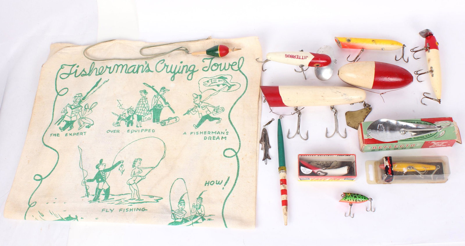 VINTAGE FISHING LURES, BOBBERS, & CRYING TOWEL: 97235VINTAGE FISHING LURES, BOBBERS, & CRYING TOWEL Vintage fishing equipment to include a cloth crying towel, a coin silver C. Kausch Bath NY lure, a Barracuda reflecto spoon lure, a Lazy Ike lure, a