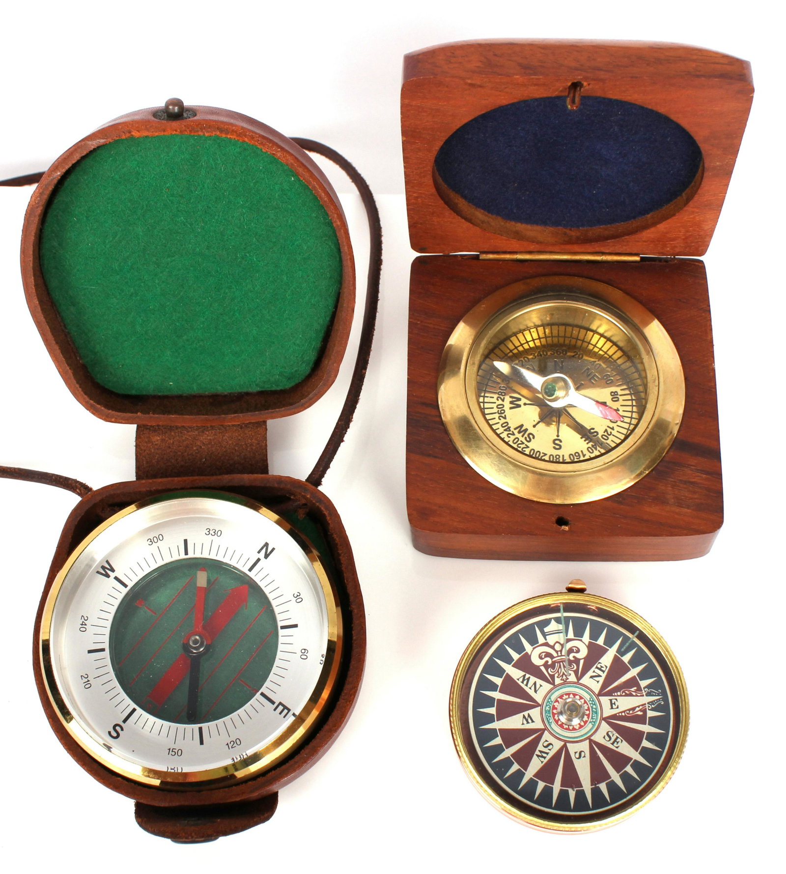 VINTAGE COMPASSES BARIGO & OTHERS - LOT OF 3: 97253VINTAGE COMPASSES BARIGO & OTHERS - LOT OF 3 Lot of 3 vintage compasses to include one unmarked brass compass in wooden box, one brass and copper compass with colorful face, and one Barigo German