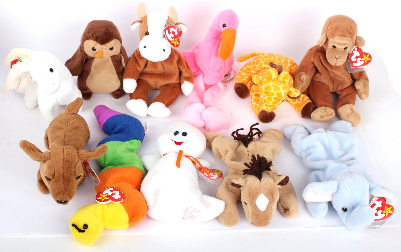 1996 RELEASE BEANIE BABIES BY TY - LOT OF 11: 972711996 RELEASE BEANIE BABIES BY TY - LOT OF 11 Beanie Babies released in 1996 (1995 on tags) to include Twigs, Spooky, Inch, Magic, Hoot, Bongo, Weenie, Peanut, Derby, Bessie, and Pinky. All includ