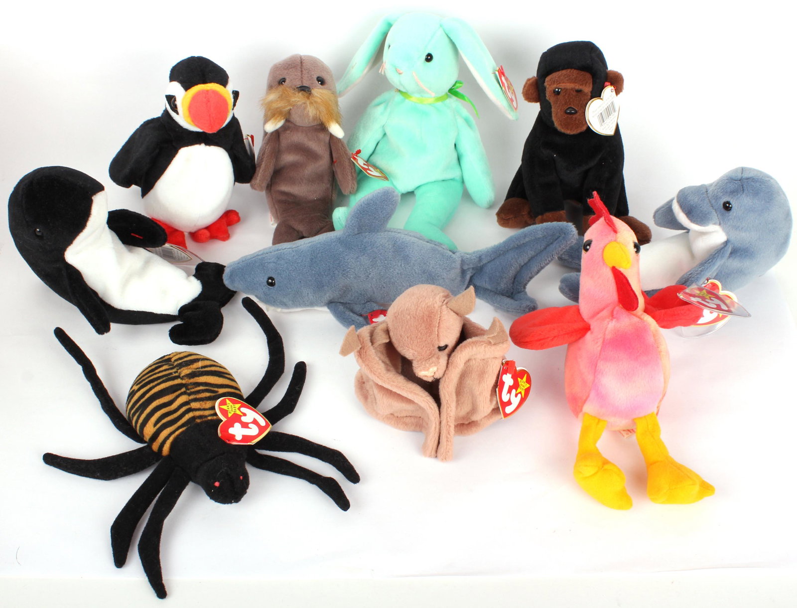1997 RELEASE BEANIE BABIES BY TY - LOT OF 10: 972731997 RELEASE BEANIE BABIES BY TY - LOT OF 10 Beanie Babies released in 1997 (1996 on tags) to include Puffer, Echo, Spinner, Jolly, Waves, Crunch, Congo, Hippity, Batty, and Strut. All include or