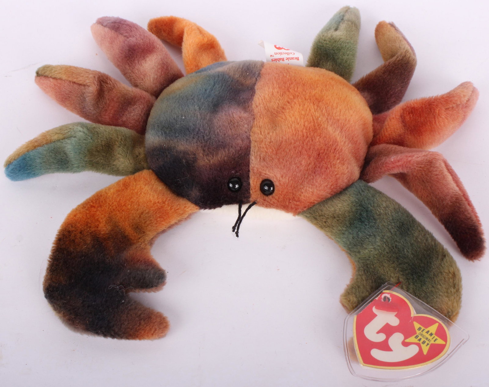 RARE CLAUDE THE CRAB BEANIE BABY ALL CAPS ERROR: 97279RARE CLAUDE THE CRAB BEANIE BABY ALL CAPS ERROR Claude the crab Beanie Baby error with his name printed in all caps "CLAUDE" on the TY tag. This Beanie Baby was released in 1997 and then dropped 