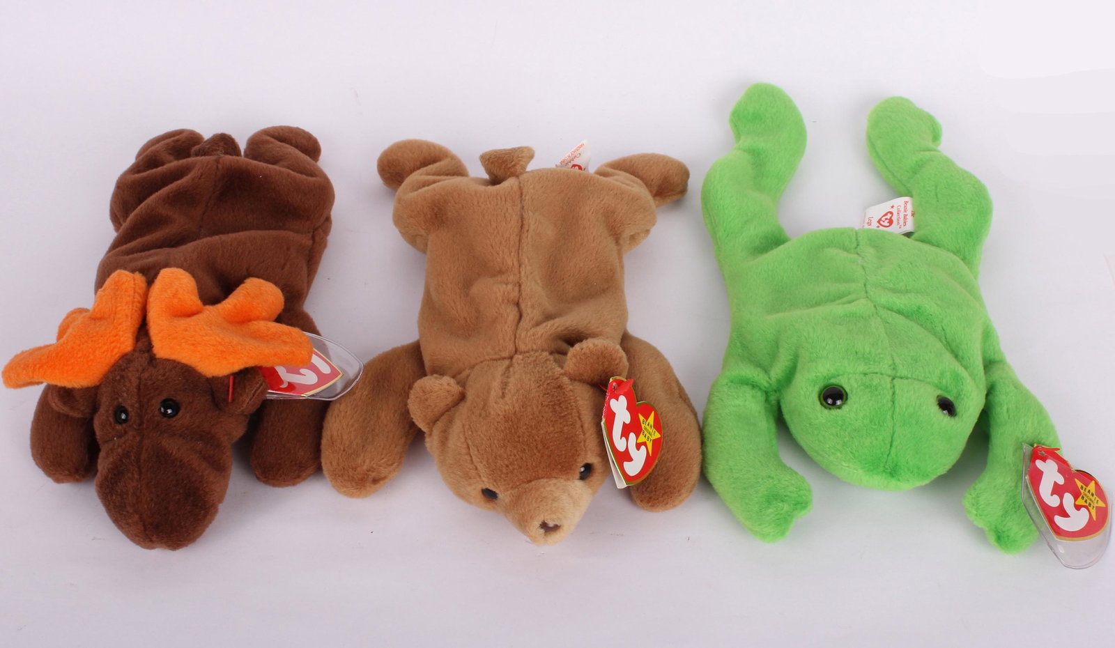 LEGS, CHOCOLATE, & CUBBIE ORIGINAL BEANIE BABIES: 97280LEGS, CHOCOLATE, & CUBBIE ORIGINAL BEANIE BABIES Rare Beanie Babies of the original 9 to include Legs, Chocolate, and Cubbie (Brownie). These were released in 1994. Cubbie beanie baby released in