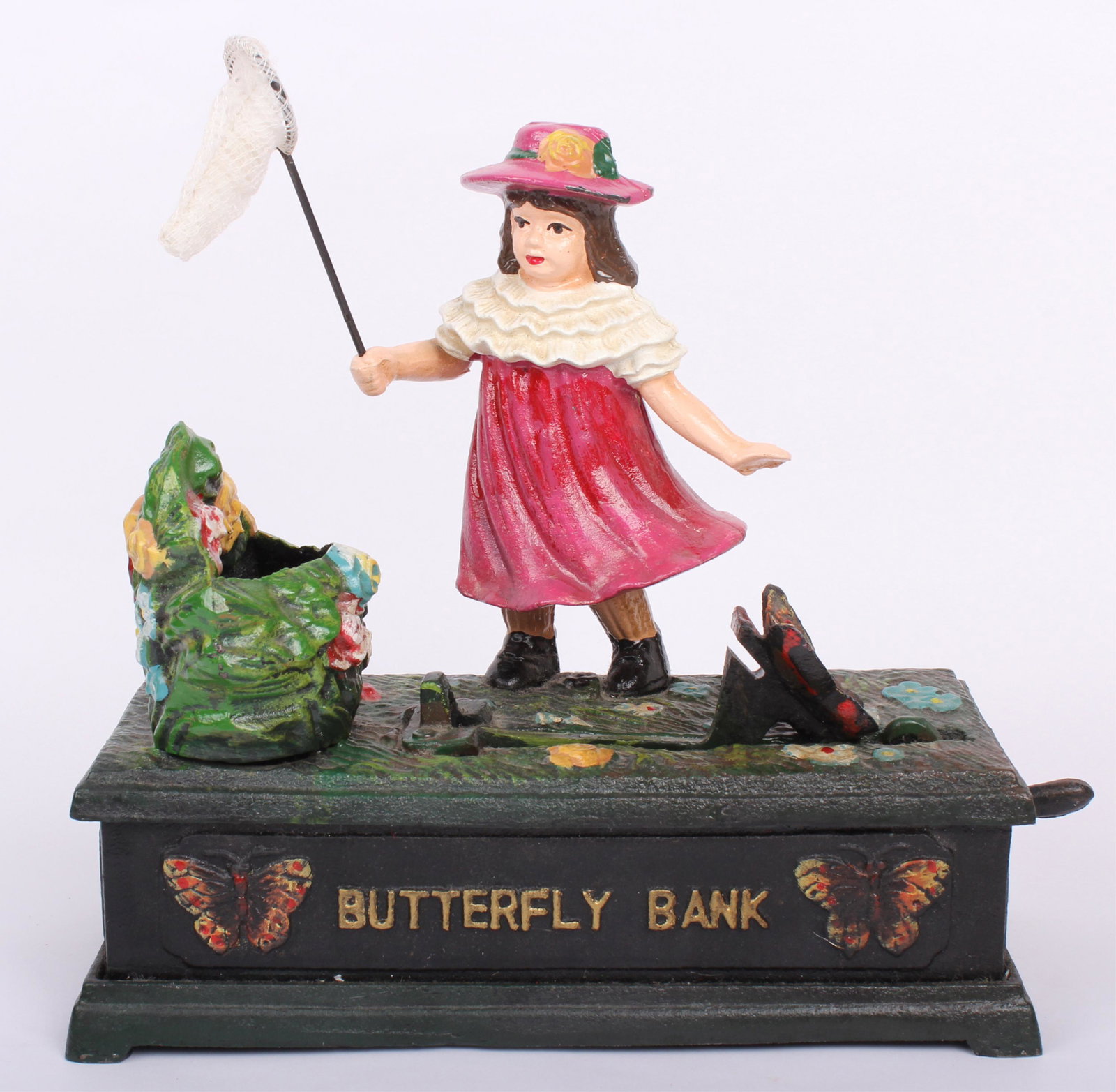 CAST IRON MECHANICAL BUTTERFLY BANK: 97317CAST IRON MECHANICAL BUTTERFLY BANK Cast iron mechanical butterfly bank. Fully operational. Some coins still inside. Size: 8" Long