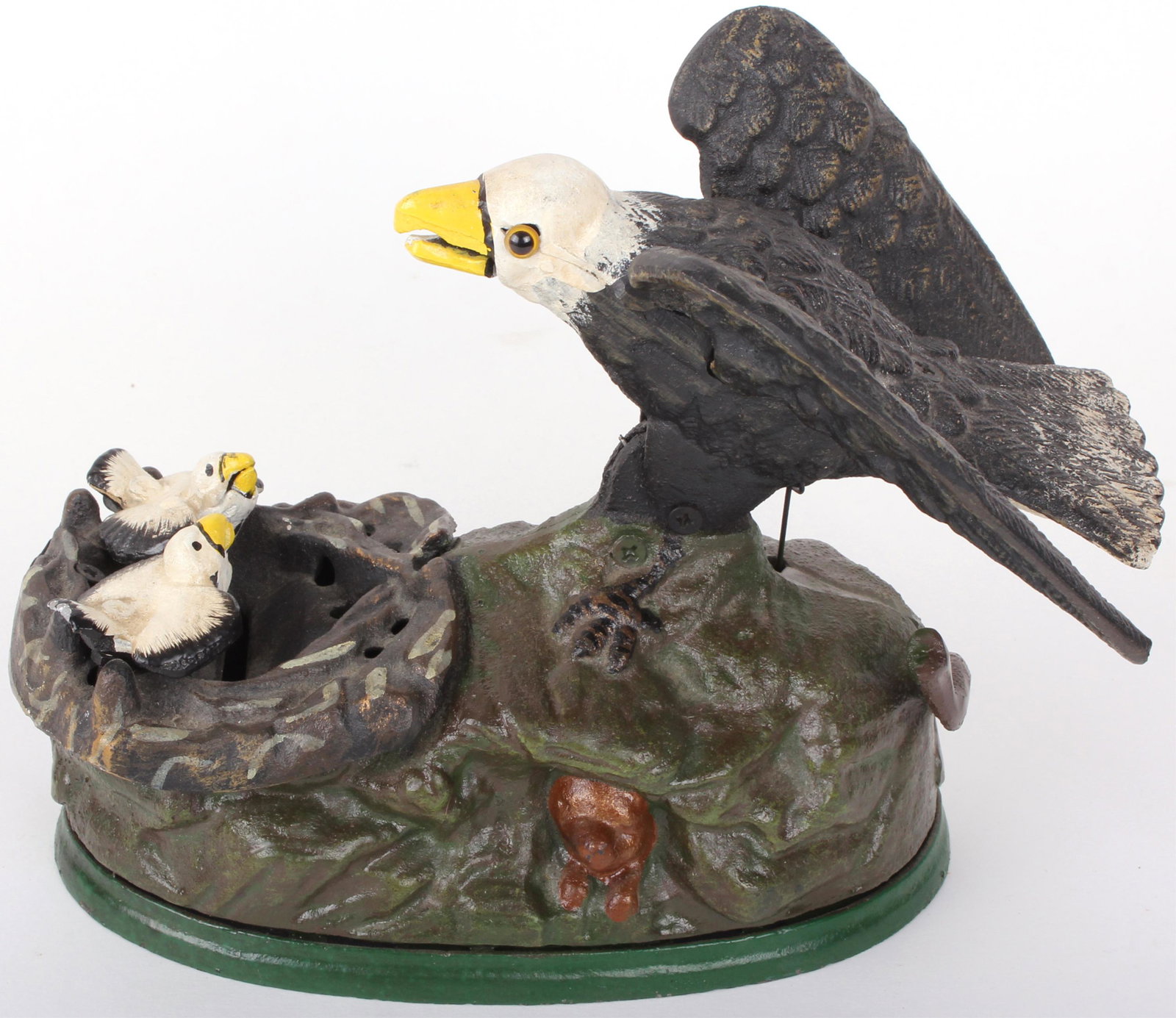 CAST IRON MECHANICAL BALD EAGLE BANK PAT. 1883: 97320CAST IRON MECHANICAL BALD EAGLE BANK PAT. 1883 Cast iron mechanical bald eagle coin bank pat. 1883. Fully operational. Some coins still inside. Size: 6" tall