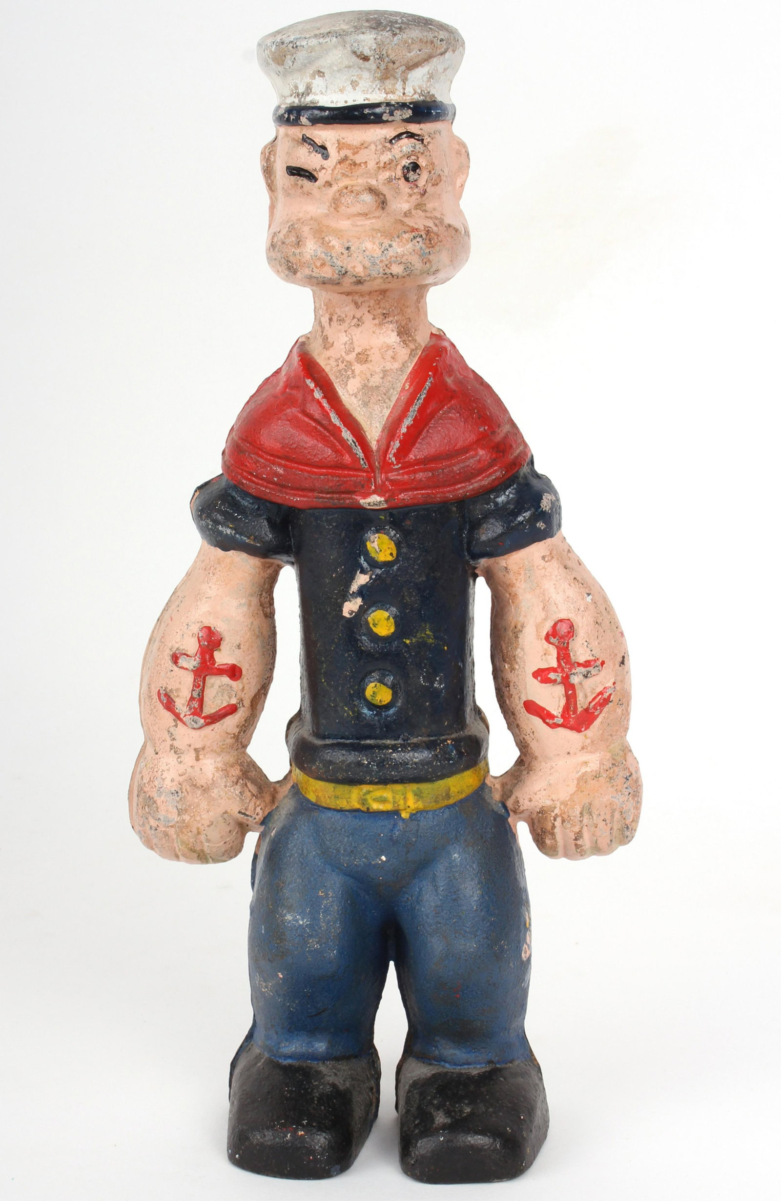 CAST IRON POPEYE THE SAILOR MAN COIN BANK 1950'S: 97322CAST IRON POPEYE THE SAILOR MAN COIN BANK 1950'S Cast iron Popeye the sailor man coin bank. Unscrew to open into two separate pieces. Some coins still inside. Size: 9" tall