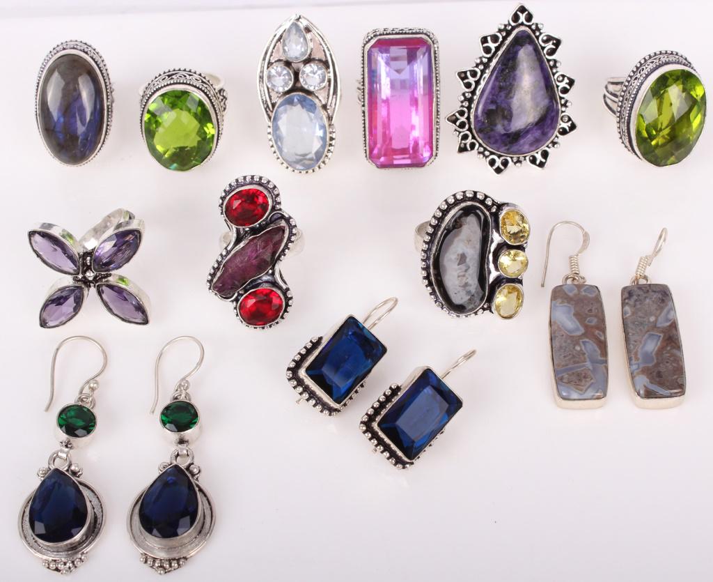 STERLING SILVER GEMSTONE RINGS & EARRINGS - (12): STERLING SILVER GEMSTONE RINGS & EARRINGS - (12) Sterling silver gemstone rings & earrings to include nine rings composed of colored glass, labradorite, and agate, and three pairs of earrings composed