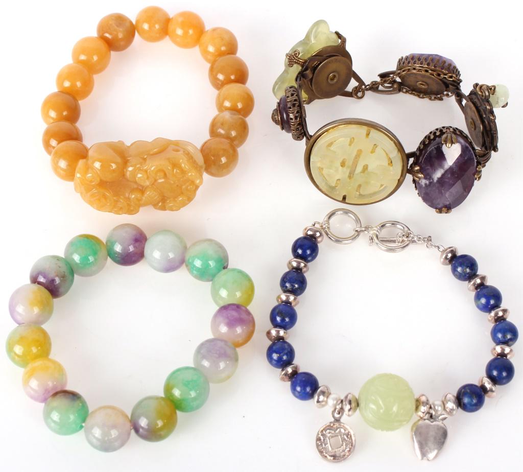 POLISHED JADE BEADED BRACELETS - LOT OF 4: POLISHED JADE BEADED BRACELETS - LOT OF 4 Polished jade beaded bracelets to include a yellow, a green and purple, a green with blue lapis, and a bronze with inset stones. Weight: 175.3 grams Condition