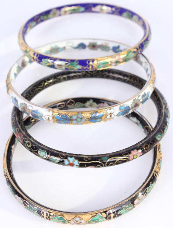CHINESE CLOISONNE BANGLE BRACELETS - LOT OF 4: CHINESE CLOISONNE BANGLE BRACELETS - LOT OF 4 Lot of four cloisonne metal bangle bracelets, one blue, one white, two black. Asian Weight: 90 grams Condition: Fine.