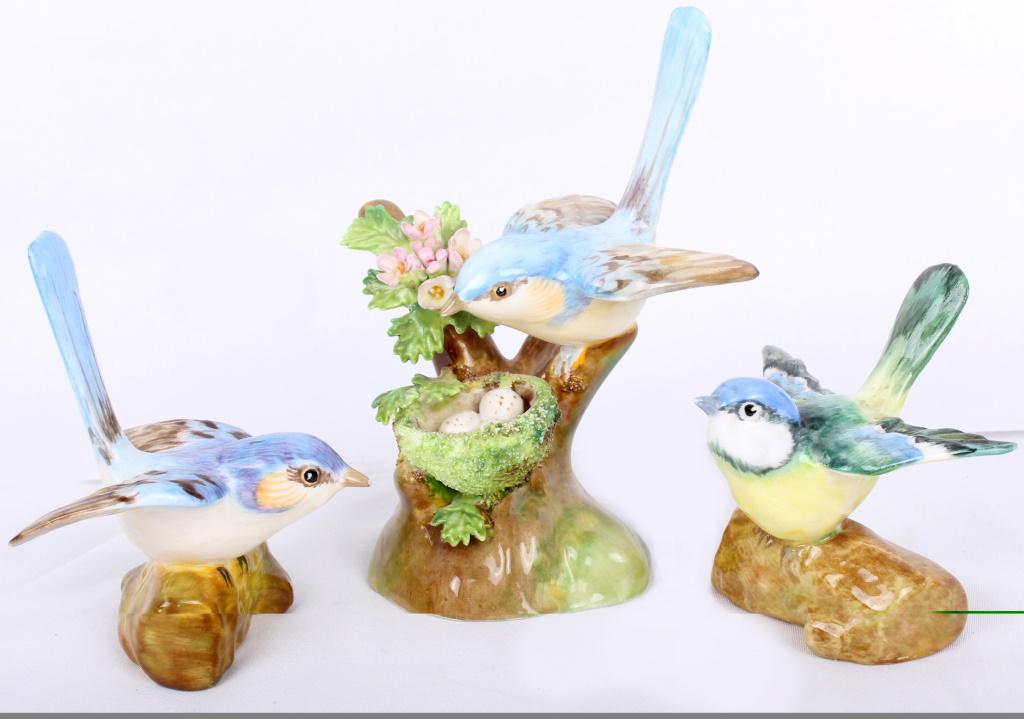 CROWN STAFFORDSHIRE CERAMIC BIRD FIGURINES(3): CROWN STAFFORDSHIRE CERAMIC BIRD FIGURINES(3) Crown Staffordshire J. T. Jones (1898-1958) designed ceramic bird statuary to include two individual birds and one piece with a bird over its nest. Size: