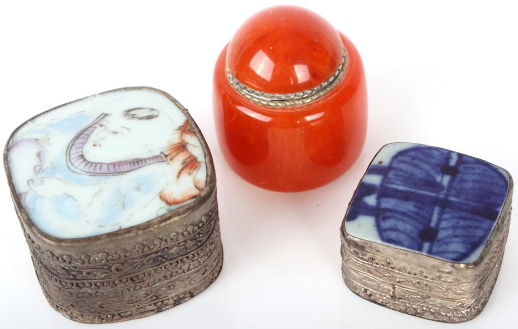CHINESE PORCELAIN & BAKELITE BOXES - LOT OF 3: CHINESE PORCELAIN & BAKELITE BOXES - LOT OF 3 Chine vintage boxes to include one bakelite and silver alloy snuff jar and 2 porcelain and metal alloy boxes. The covers of these boxes are made from piec