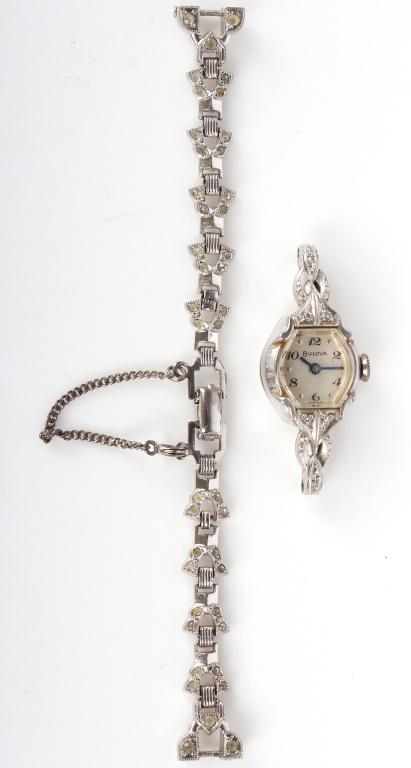 10K GOLD FILLED BULOVA WATCH W/ STERLING STRAP: 10K GOLD FILLED BULOVA WATCH W/ STERLING STRAP 10 karat gold filled Bulova watch with sterling strap and clasp. Face of watch reads, "Bulova Swiss", and reverse reads "10 K Rolled Gold Bulova Plate L3