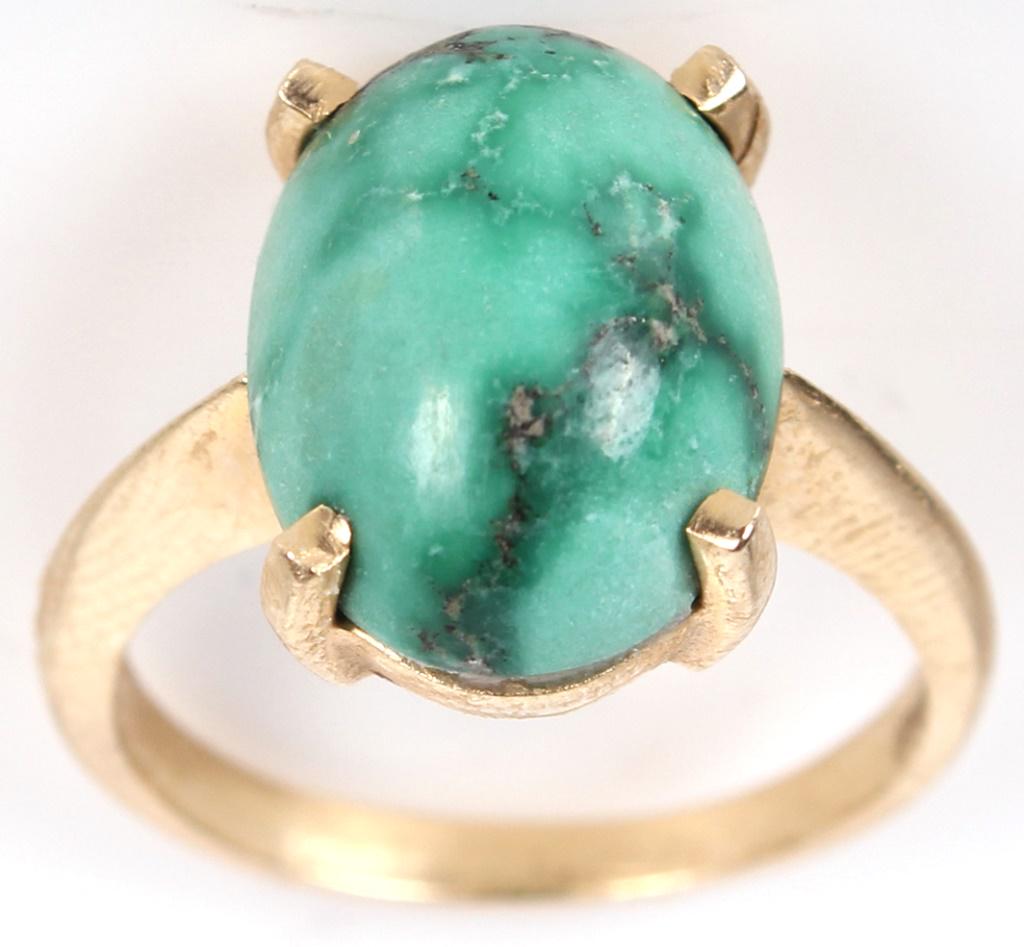 14K YELLOW GOLD 3.5 CT AMAZONITE LADIES RING: 1002514K YELLOW GOLD 3.5 CT AMAZONITE LADIES RING 14 karat yellow gold approximately 3.5 carat amazonite ladies ring. Weight: 4.3 Grams Size: 6