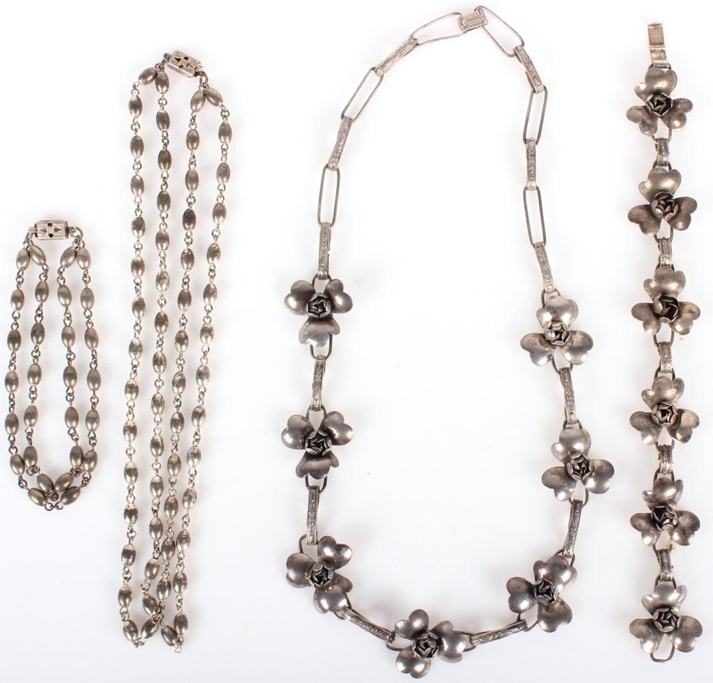 ANTIQUE STERLING SILVER BRACELET & NECKLACE SETS: 10106ANTIQUE STERLING SILVER BRACELET & NECKLACE SETS Antique sterling silver bracelet and necklace set, one featuring a floral design and wire links, and one with beaded design. Weight: 70.4 gramsWe