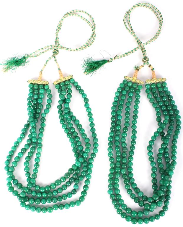 GREEN JADE BEADED NECKLACES - 1806 CTW - LOT OF 2: 10207GREEN JADE BEADED NECKLACES - 1806 CTW - LOT OF 2 Green jadeite beaded necklaces with 8.5mm beads on 4 strands. Has adjustable woven cords. Size: 10" and 11" at shortest
