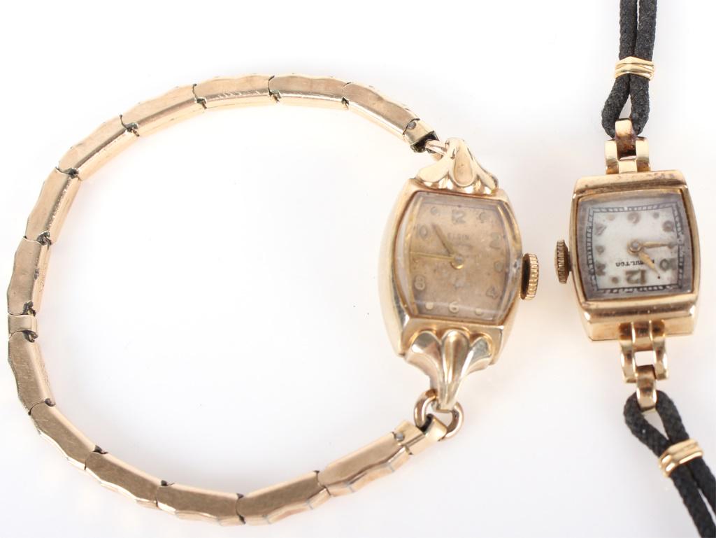 ELGIN & HAMILTON GOLD FILLED LADIES WRIST WATCHES: 10223ELGIN & HAMILTON GOLD FILLED LADIES WRIST WATCHES Elgin and Hamilton gold filled ladies wristwatches. Elgin watch has gold-toned watch band and is vintage. Marked "10k gold filled" on the bezel. 