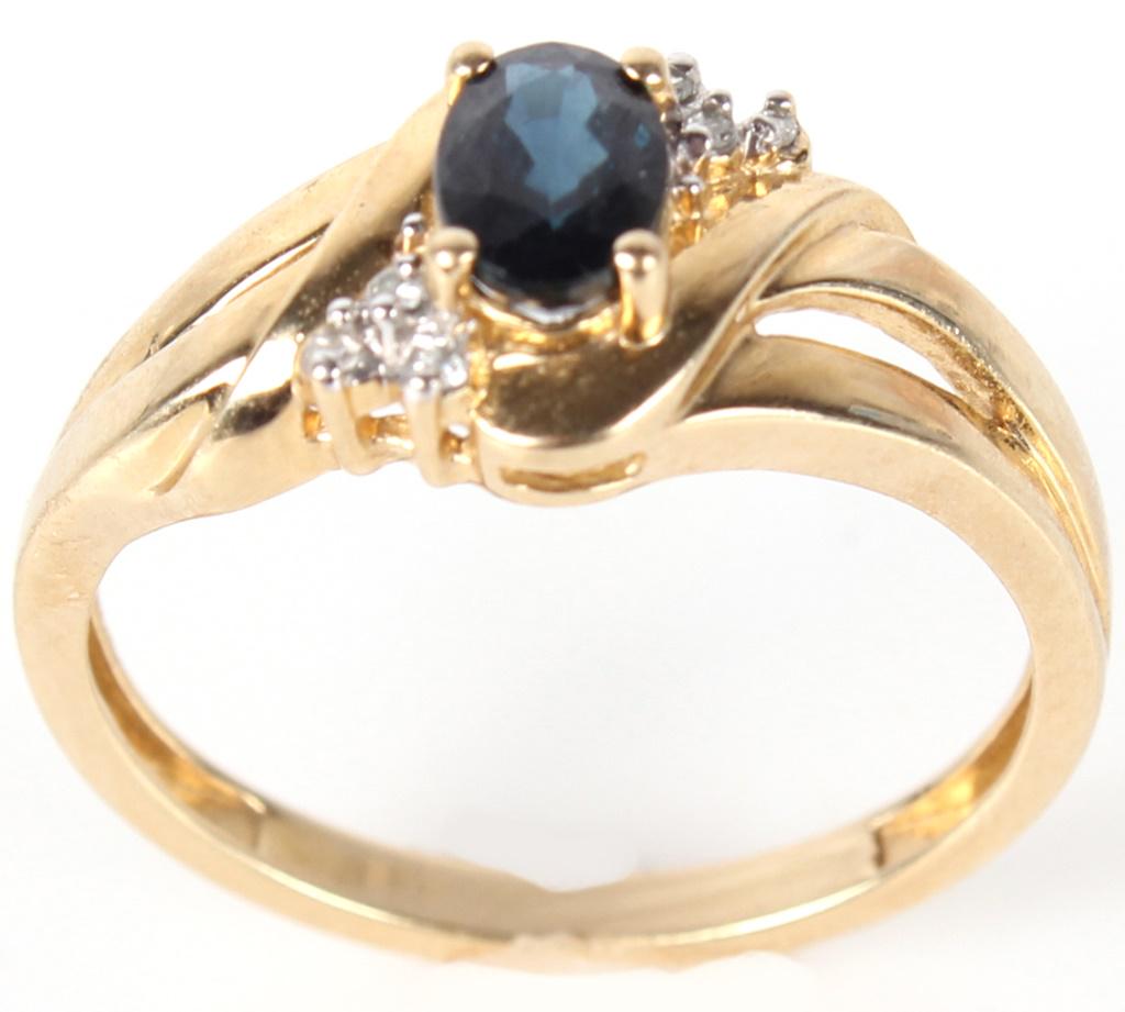 10K YELLOW GOLD SAPPHIRE DIAMOND LADIES RING: 1040910K YELLOW GOLD SAPPHIRE DIAMOND LADIES RING10 karat yellow gold sapphire diamond ladies ring. Ring features one oval cut approximately 0.2 carat sapphire, and 6 approximately .01 carat round cut