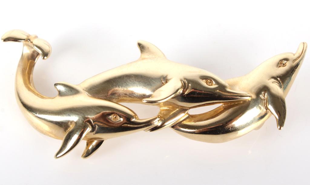 14K YELLOW GOLD LADIES DOLPHIN PENDANT: 1047014K YELLOW GOLD LADIES DOLPHIN PENDANT14 karat yellow gold ladies dolphin pendant. Marked "14k".15.7 Grams2.25"