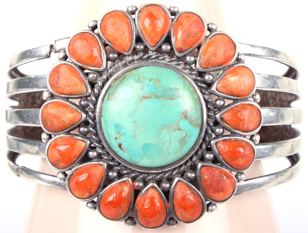 BARSE VINTAGE .925 SILVER TURQUOISE CUFF BRACELET: 10483BARSE VINTAGE .925 SILVER TURQUOISE CUFF BRACELETVintage Barse sterling silver turquoise and red jasper heavy cuff bracelet with radial Sun pattern.50.8 Grams2.25" inside measurement