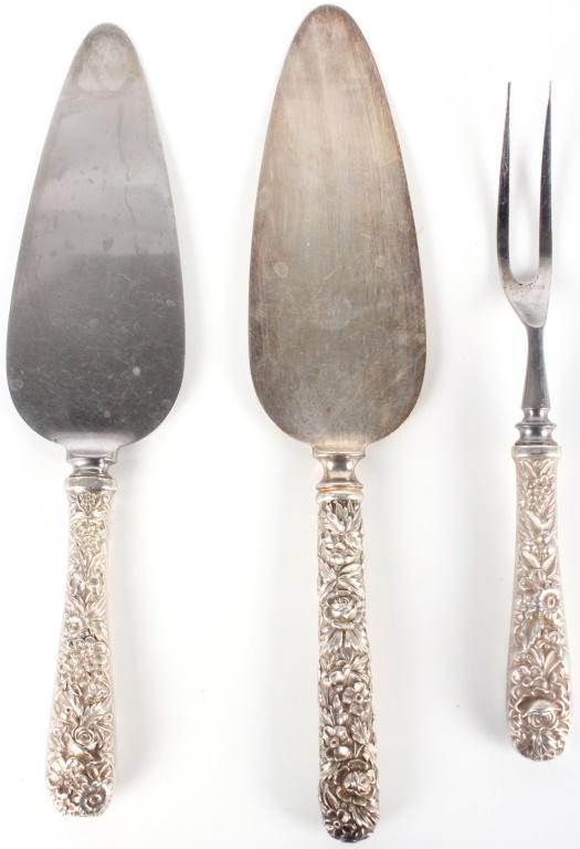 KIRK STERLING SILVER STAINLESS STEEL FLATWARE -3: 10510KIRK STERLING SILVER STAINLESS STEEL FLATWARE -3Kirk sterling silver stainless steel flatware. Lot to include two pie servers and one meat fork, all with sterling silver handles and stainless ste