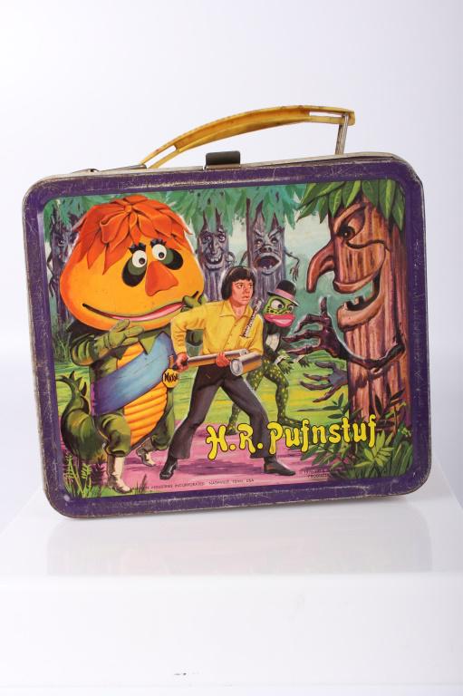VINTAGE H. R. PUFNSTUF TIN LUNCHBOX WITH THERMOS: 10657VINTAGE H. R. PUFNSTUF TIN LUNCHBOX WITH THERMOSVintage 1970 H. R. Pufnstuf tin lunchbox with Aladdin thermos with lid.8 X 5 X 7"