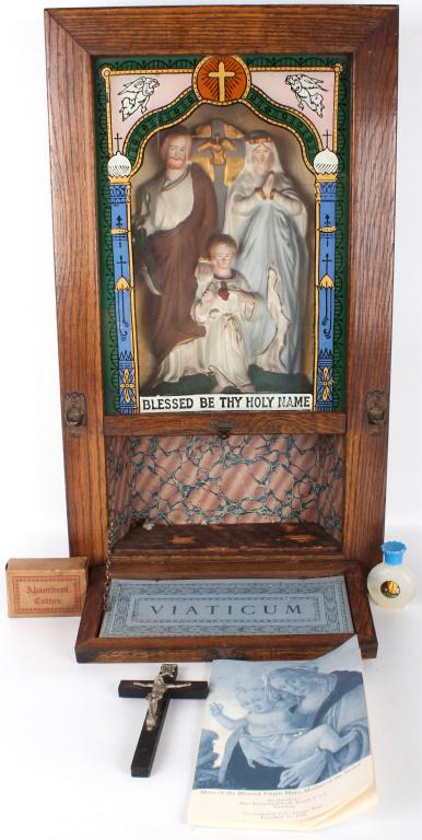 ANTIQUE CATHOLIC VIATICUM LAST RITES WALL CABINET: 10658ANTIQUE CATHOLIC VIATICUM LAST RITES WALL CABINETAntique Catholic Viaticum last rites wall cabinet. This wall cabinet is from the early 1900s. It has a compartment containing a small crucifix, a 