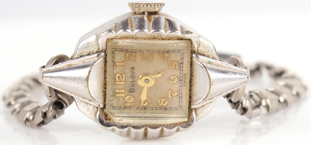 VINTAGE 1953 BULOVA LADIES WRISTWATCH 284845: 10312VINTAGE 1953 BULOVA LADIES WRISTWATCH 284845 Vintage 1953 Bulova ladies wristwatch. Back of bezel reads "Bulova L3 284845". Wristwatch Bulova Ladies Size: 3" Diameter 3" Diameter