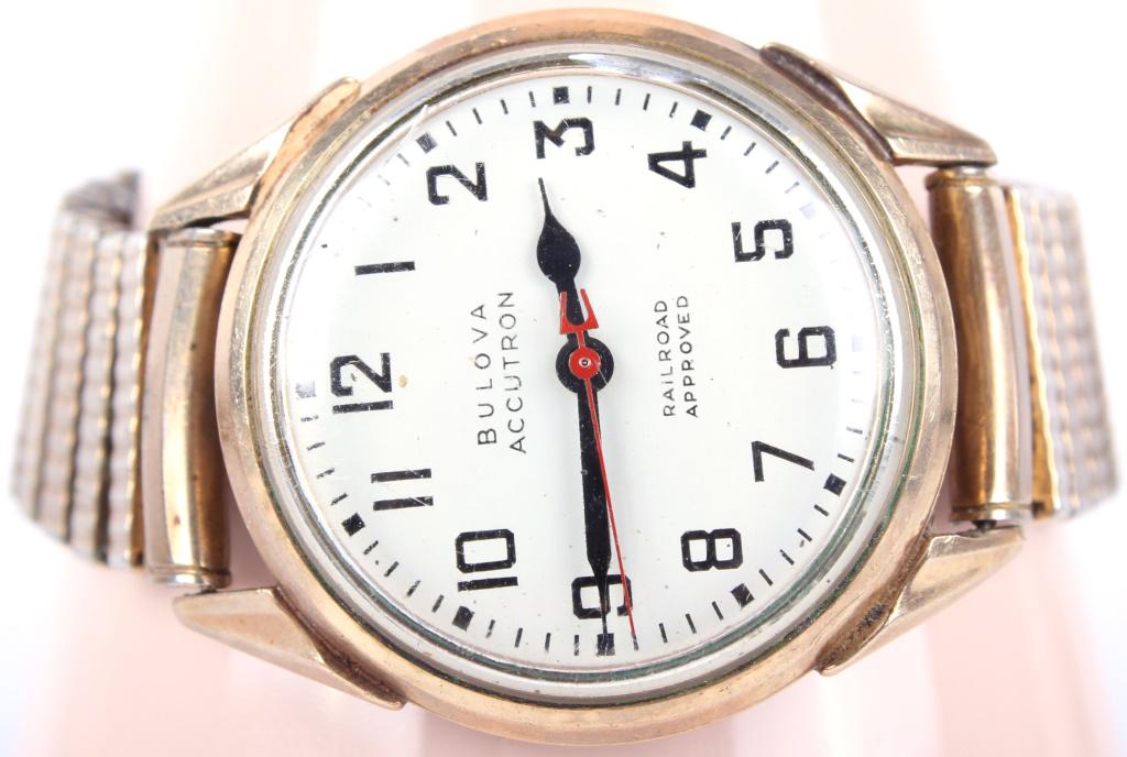 BULOVA ACCUTRON RAILROAD APPROVED 10K GF WATCH: 10316BULOVA ACCUTRON RAILROAD APPROVED 10K GF WATCH Bulova Accutron Railroad Approved 10 karat gold filled watch. Vintage mens watch from 1970. Both bezel and strap are 10 karat gold filled. Wristwatc
