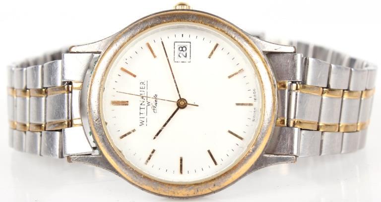 WITTNAUER TRIESTE SWISS TWO TONE MENS WATCH: 10389WITTNAUER TRIESTE SWISS TWO TONE MENS WATCH Wittnauer Trieste Swiss two tone mens watch. Watch has date indicator, and is water resistant. Wristwatch Wittnauer Mens Weight: 60.7 Grams 60.7 Grams