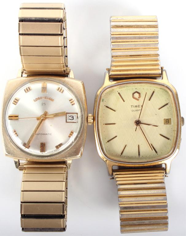 TIMEX & LORD ELGIN MEN'S WRISTWATCHES - LOT OF 2: 10392TIMEX & LORD ELGIN MEN'S WRISTWATCHES - LOT OF 2 Timex and Lord Elgin men's wristwatches. Lord Elgin watch is 10K gold filled. Timex watch is stainless steel. Gold filled Wristwatch Timex, Elgin 