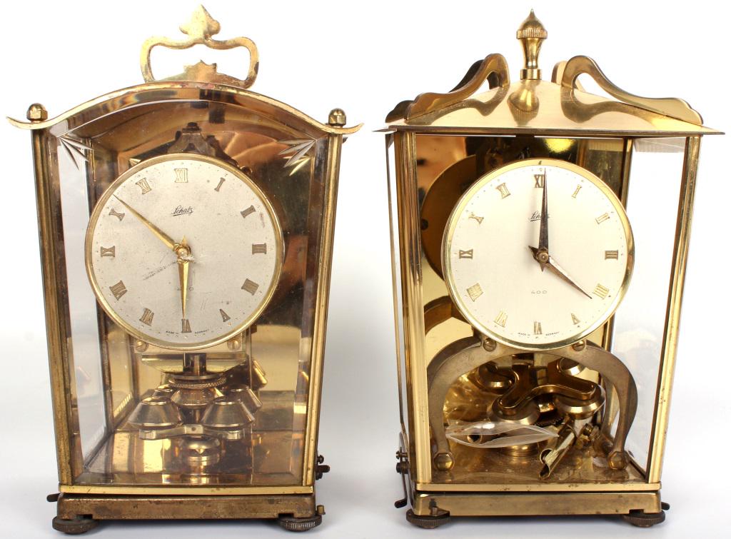 SCHATZ 400 DAY #53 BRASS MANTEL CLOCKS - LOT OF 2: 10440SCHATZ 400 DAY #53 BRASS MANTEL CLOCKS - LOT OF 2 Schatz 400 day brass model #53 mantel clocks - lot of 2. mantel clock Schatz Size: 12" w/ glass Condition: Untested. Sold As-Is w/ pieces 12" w/ 