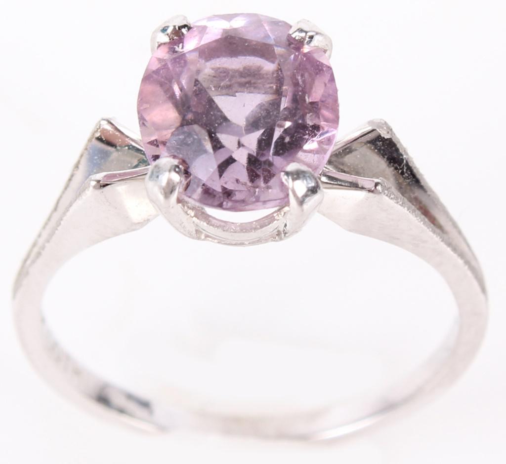 10K WHITE GOLD GOTHIC RING WITH AMETHYST STONE: 1080110K WHITE GOLD GOTHIC RING WITH AMETHYST STONE 10k white gold Gothic ring with amethyst stone. Comes in box. Amethyst Weight: 2.20 grams Size: Size 6Condition: fine. 2.20 grams Size 6