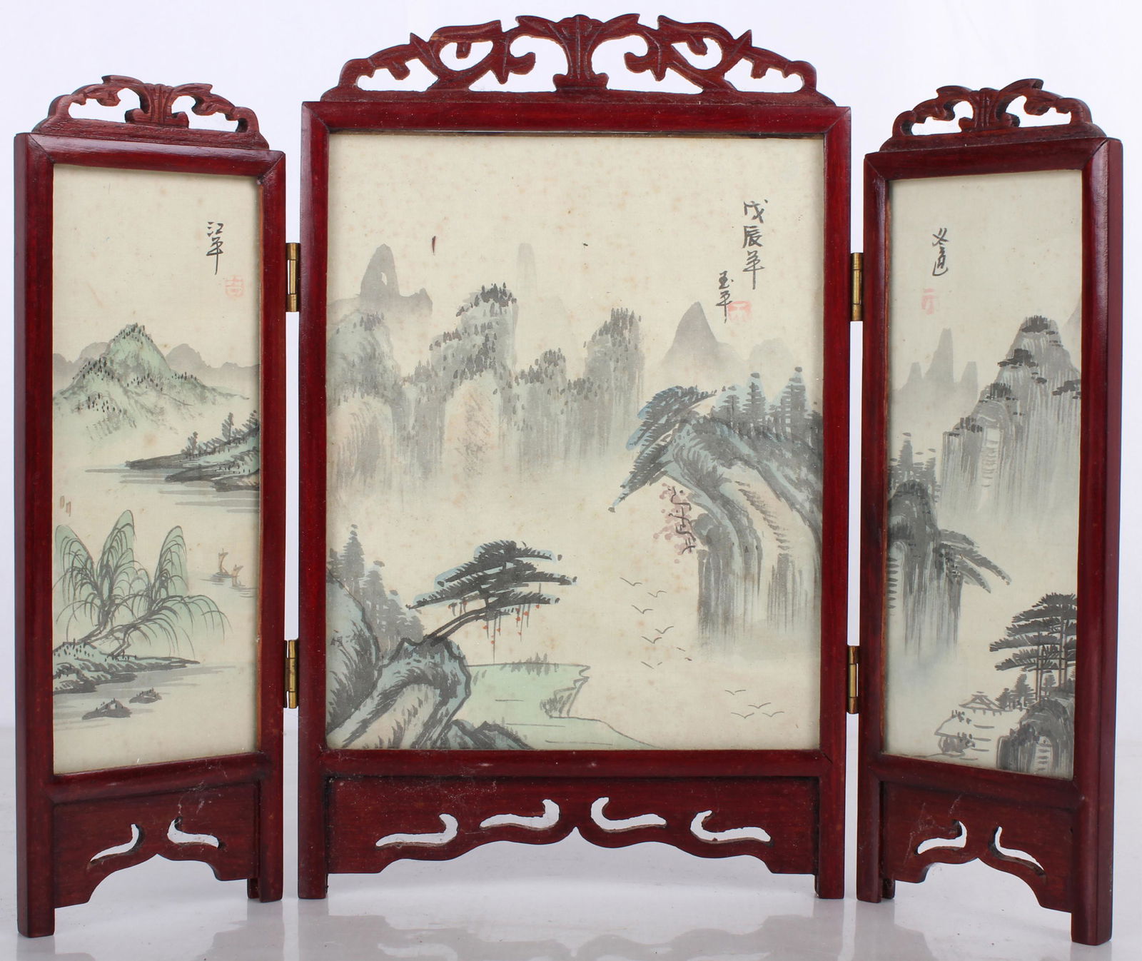 ASIAN HAND PAINTED GLASS ENCASED SILK TABLE SCREEN: 11399ASIAN HAND PAINTED GLASS ENCASED SILK TABLE SCREENAsian hand painted glass-encased silk table screen. Painted with trees, mountains, a body of water, birds, and fog, along with Asian characters.